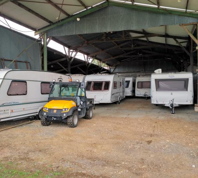caravan storage indoor with jcb