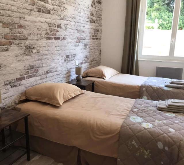 location-vacances-longeville-mer-clos-arts-chambre-lits-simples