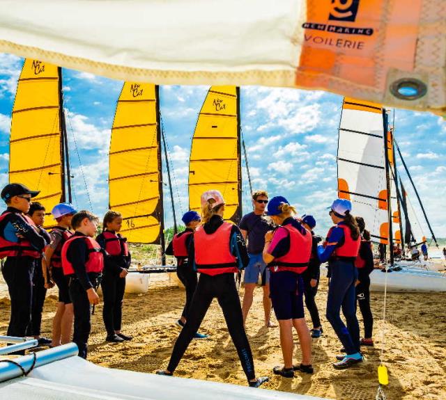 ocean_players_voile_plage_cours